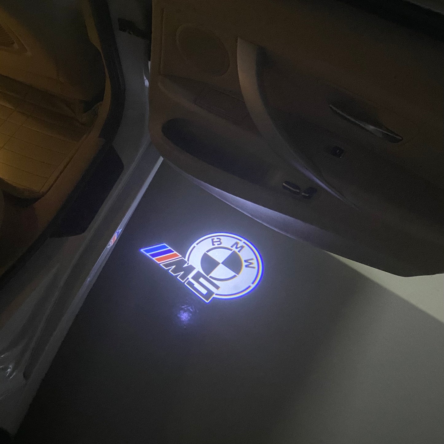 BMW  5 SERIES M5 LOGO PROJECTOT LIGHTS (quantity 1 = 1 sets/2 door lights) Nr.6024q66