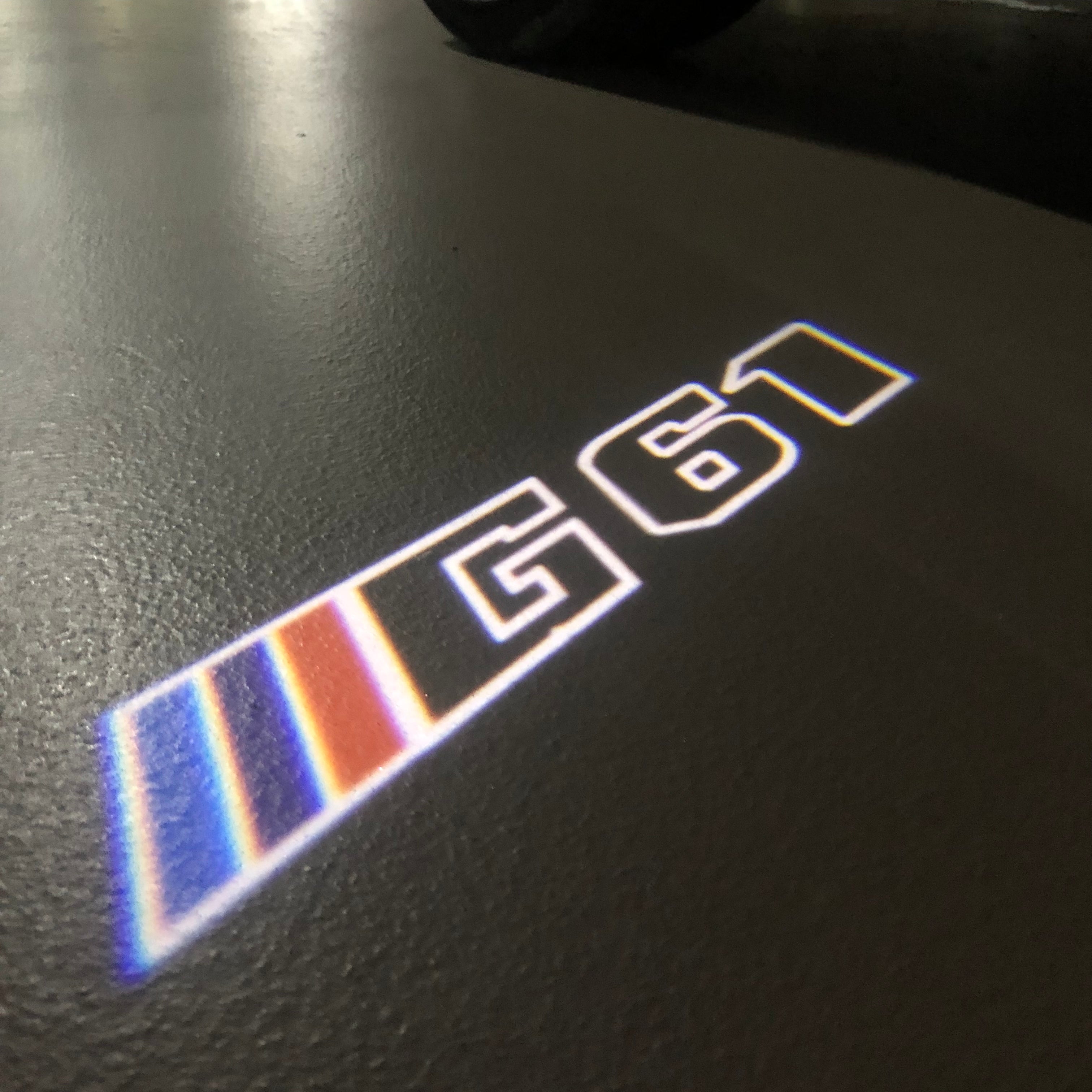 BMW   5 SERIES G61  LOGO PROJECTOT LIGHTS (quantity 1 = 1 sets/2 door lights) Nr.6024q92