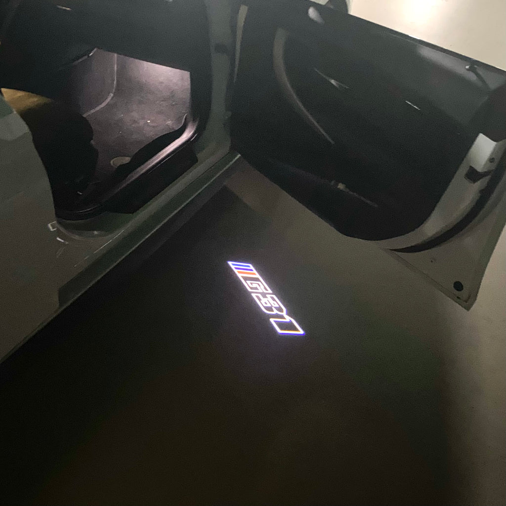 LUCES DE PROYECTOR DEL LOGOTIPO BMW M3 Nr.24 (cantidad 1 = 1 juegos / 2 luces de puerta)