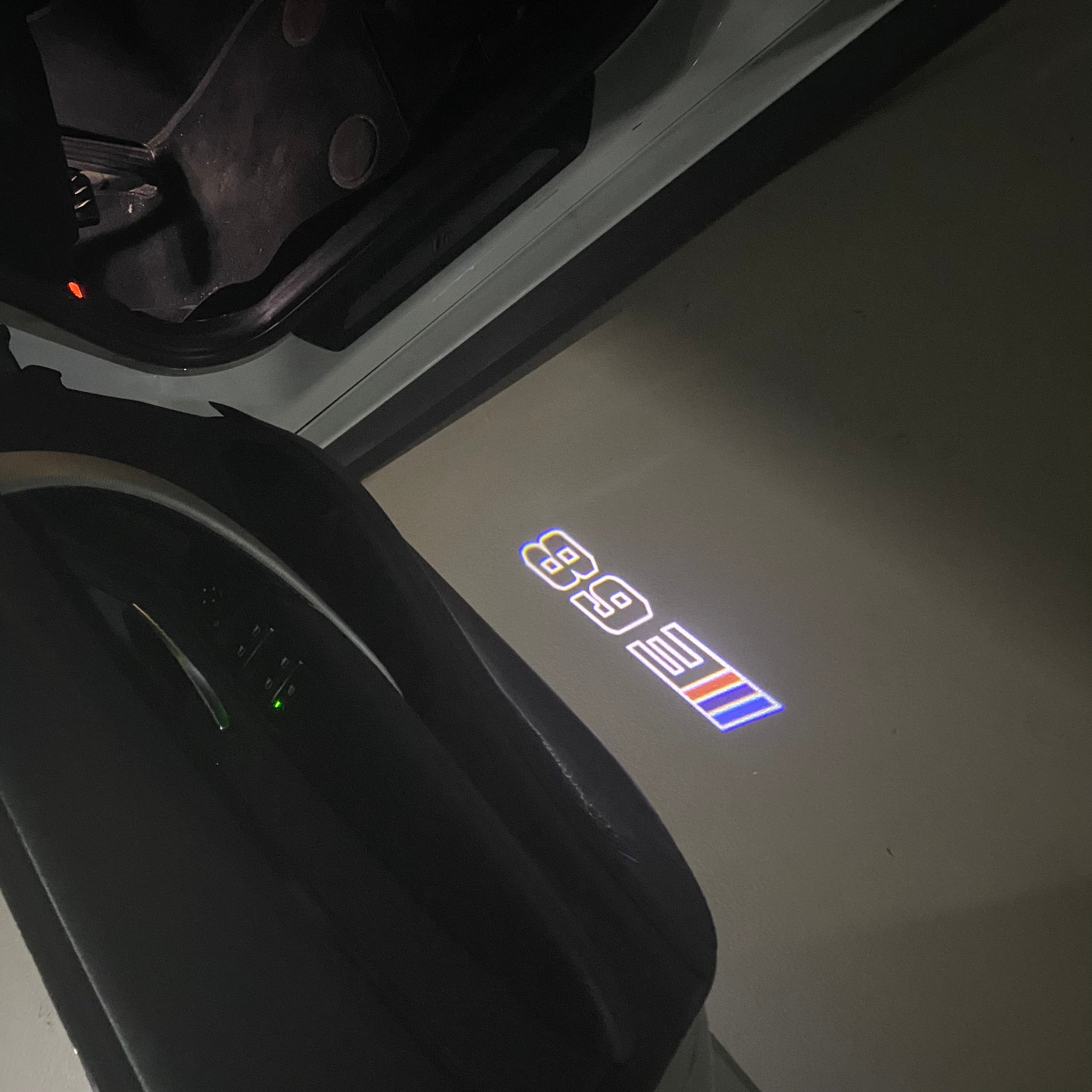 BMW 7 SERIES E68  LOGO PROJECTOT LIGHTS (quantity 1 = 1 sets/2 door lights) Nr.6024q120