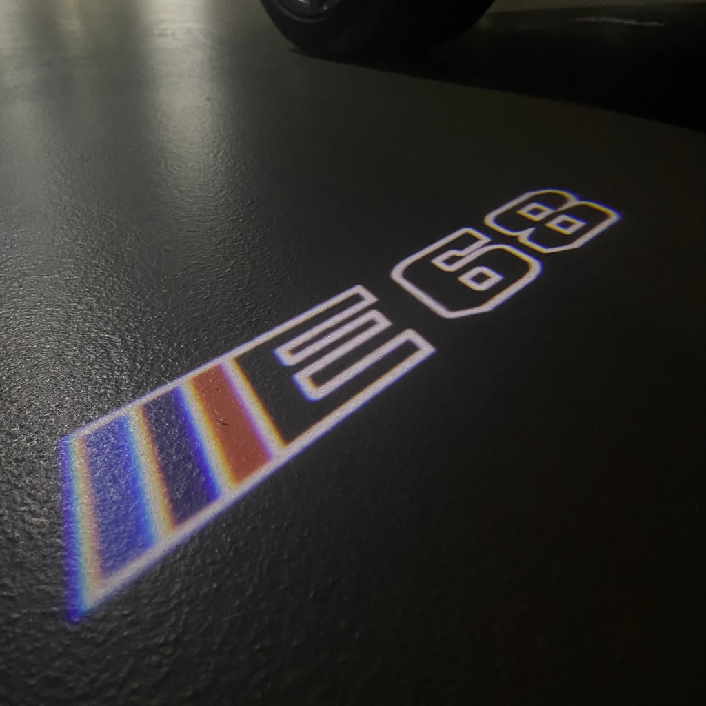 BMW 7 SERIES E68  LOGO PROJECTOT LIGHTS (quantity 1 = 1 sets/2 door lights) Nr.6024q120