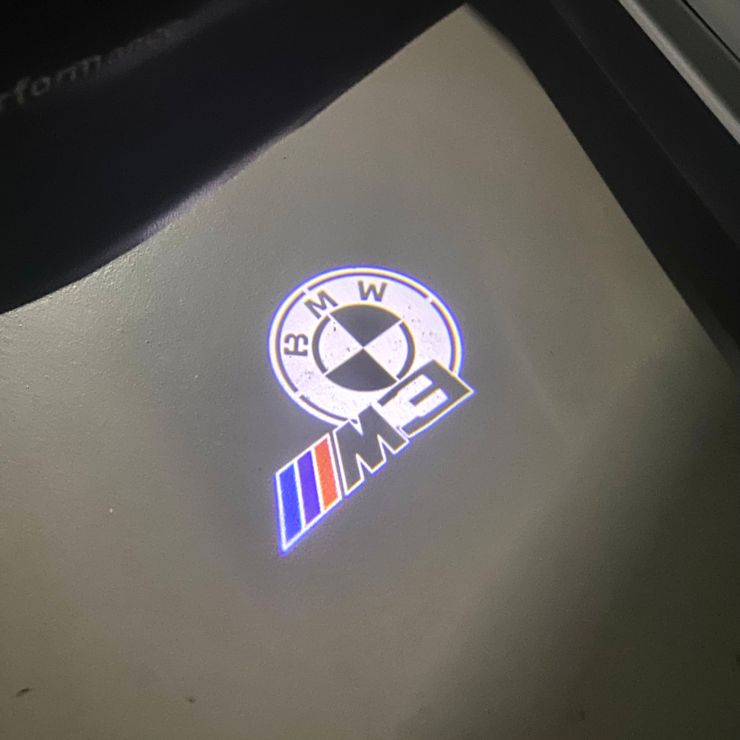 BMW 3 SERIES M3  LOGO PROJECTOT LIGHTS (quantity 1 = 1 sets/2 door lights) Nr.6024q44