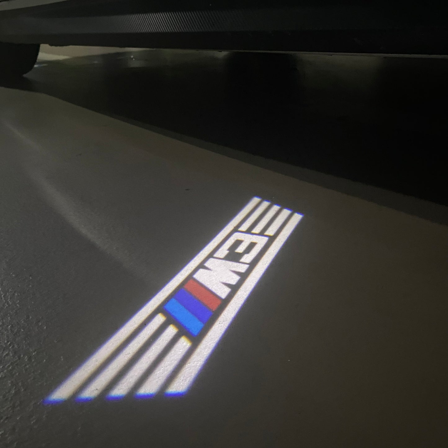 BMW 3 SERIES M3  LOGO PROJECTOT LIGHTS (quantity 1 = 1 sets/2 door lights) Nr.6024q31