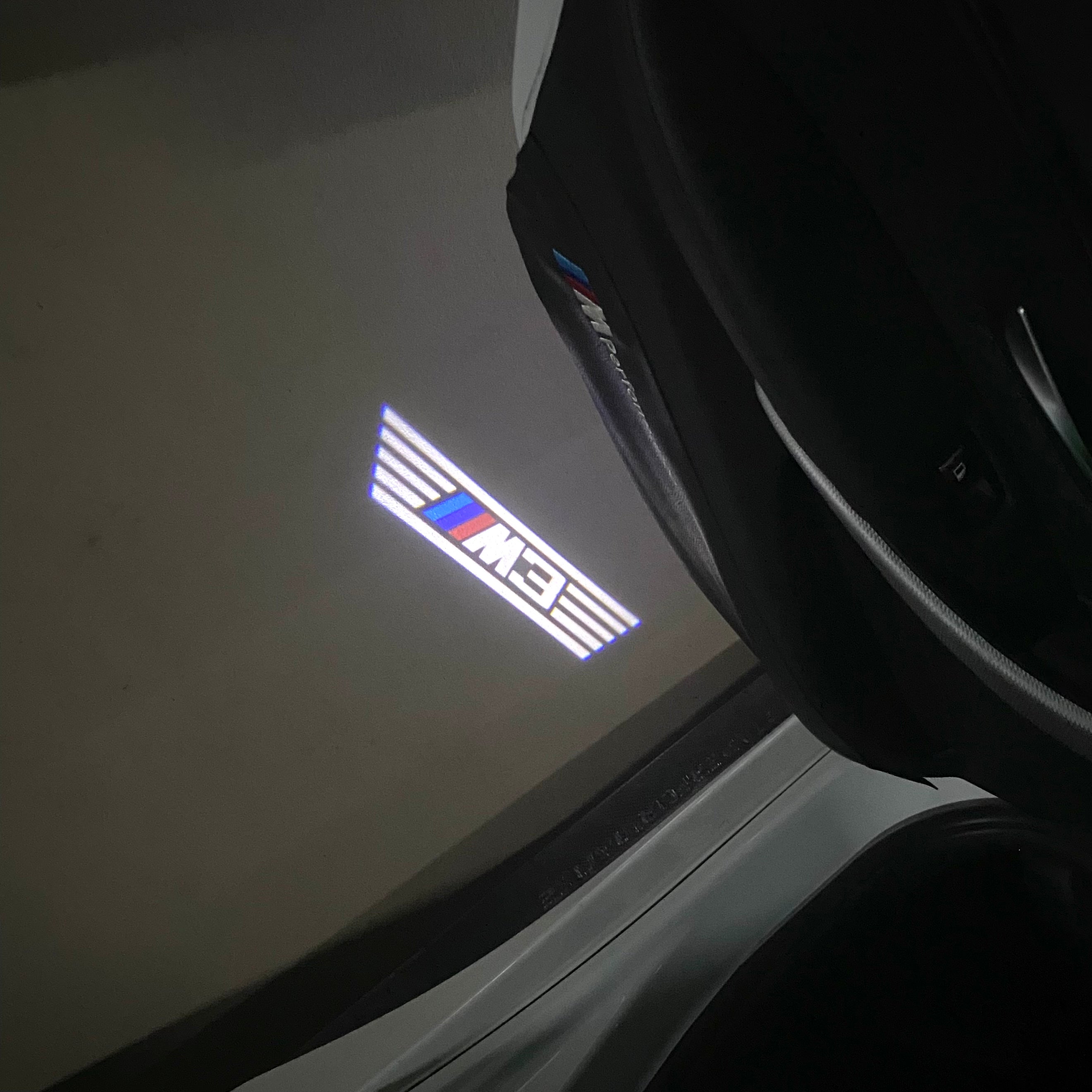 BMW 3 SERIES M3  LOGO PROJECTOT LIGHTS (quantity 1 = 1 sets/2 door lights) Nr.6024q31