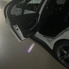 BMW 3 SERIES 330 i LOGO PROJECTOT LIGHTS (quantity 1 = 1 sets/2 door lights) Nr.6024q306