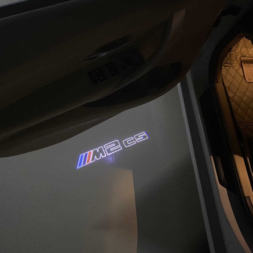 BMW  2 SERIES M2 LOGO PROJECTOT LIGHTS (quantity 1 = 1 sets/2 door lights) Nr.6024t28