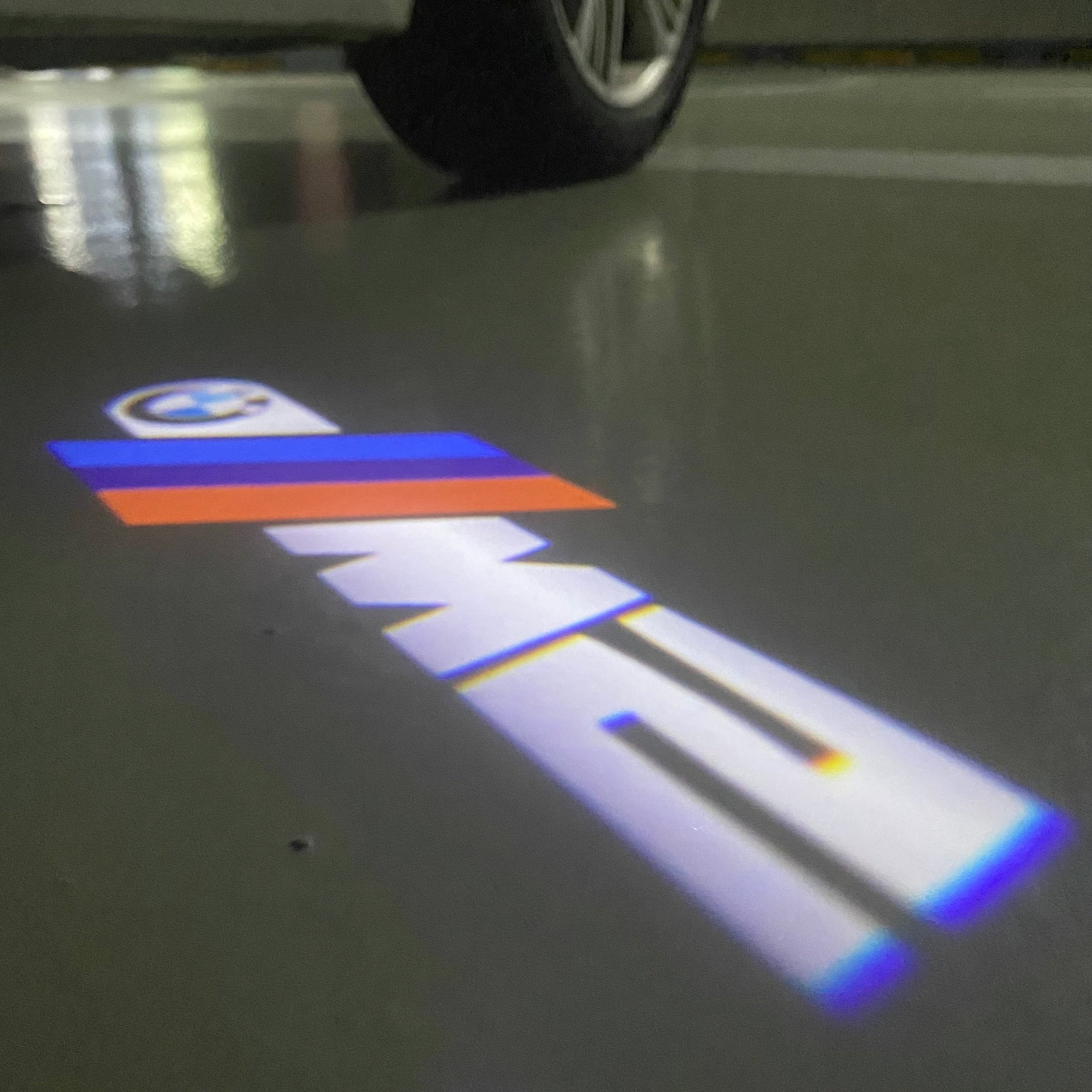 BMW  2 SERIES M2 LOGO PROJECTOT LIGHTS (quantity 1 = 1 sets/2 door lights) Nr.6024t05