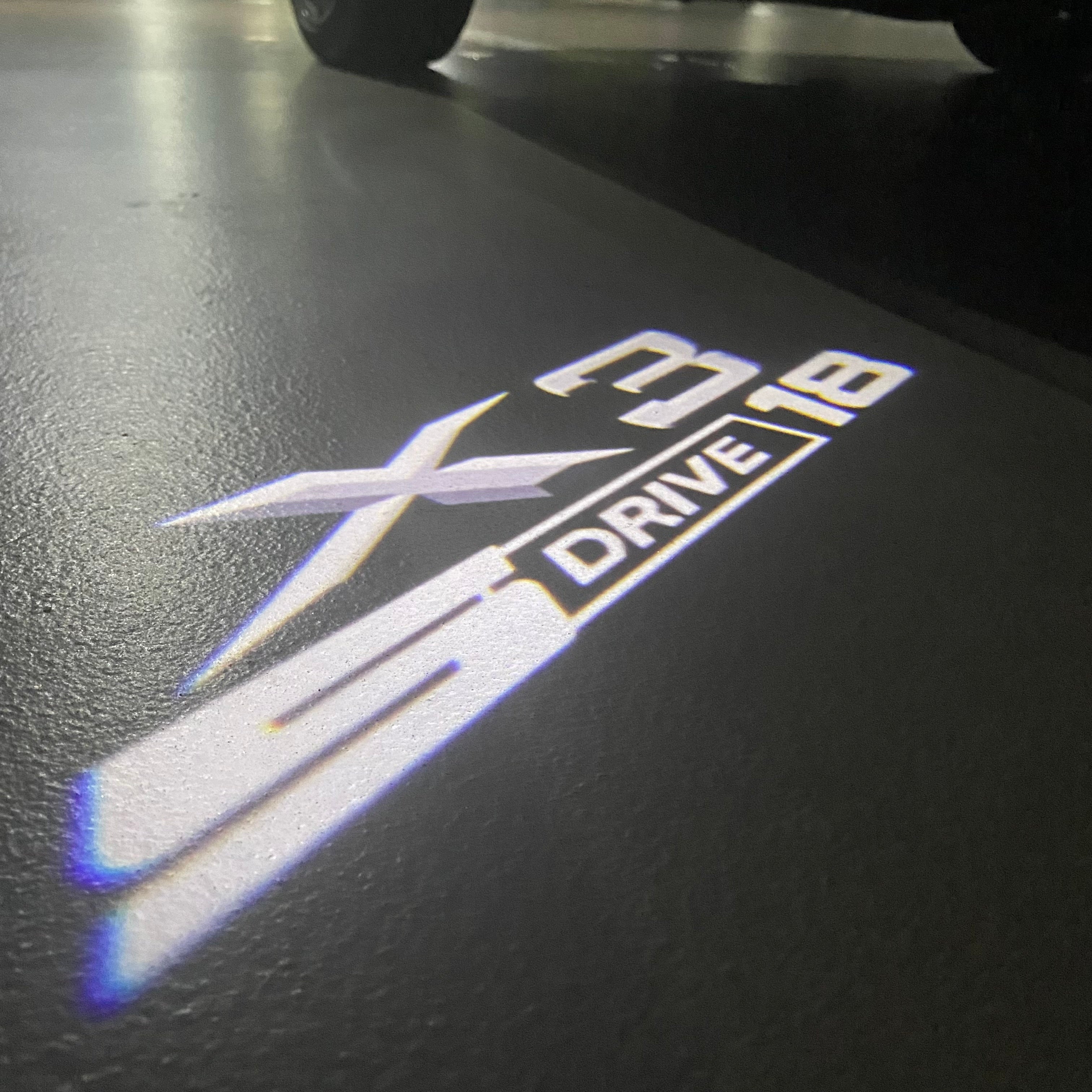 BMW X3 S Drive 18 LOGO PROJECTOT LIGHTS (quantity 1 = 1 sets/2 door lights) Nr.6024q0t26