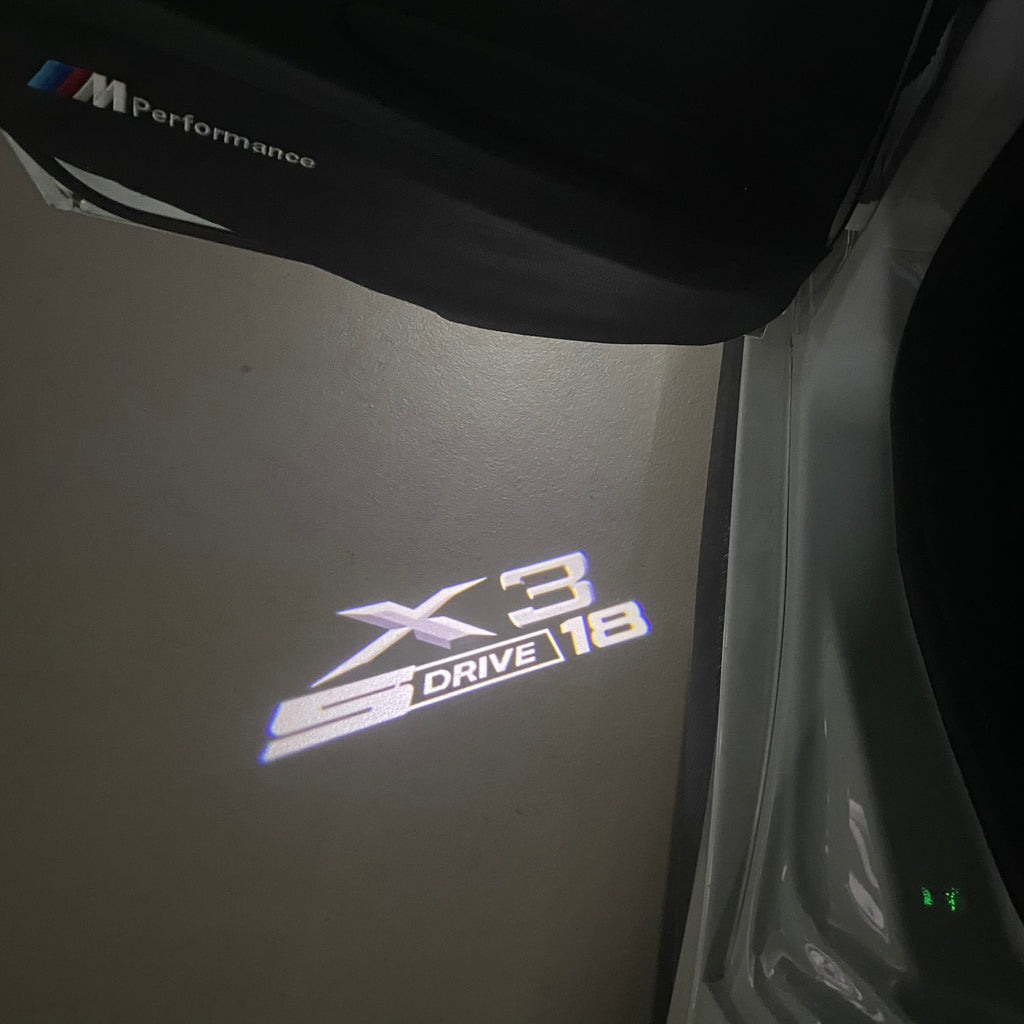 BMW X3 S Drive 18 LOGO PROJECTOT LIGHTS (quantity 1 = 1 sets/2 door lights) Nr.6024q0t26