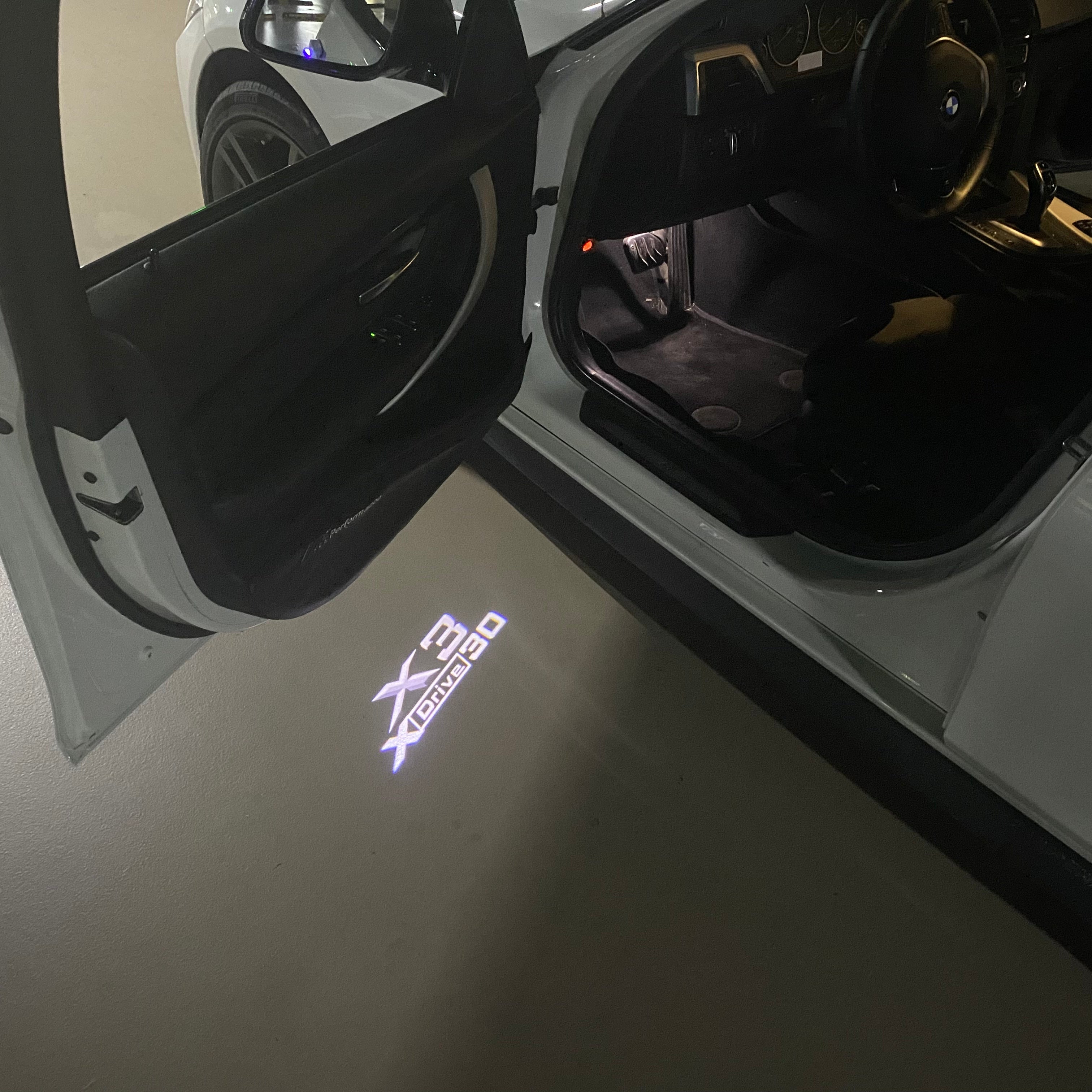 BMW X3 X Drive 30 LOGO PROJECTOT LIGHTS (quantity 1 = 1 sets/2 door lights) Nr.6024q0t25