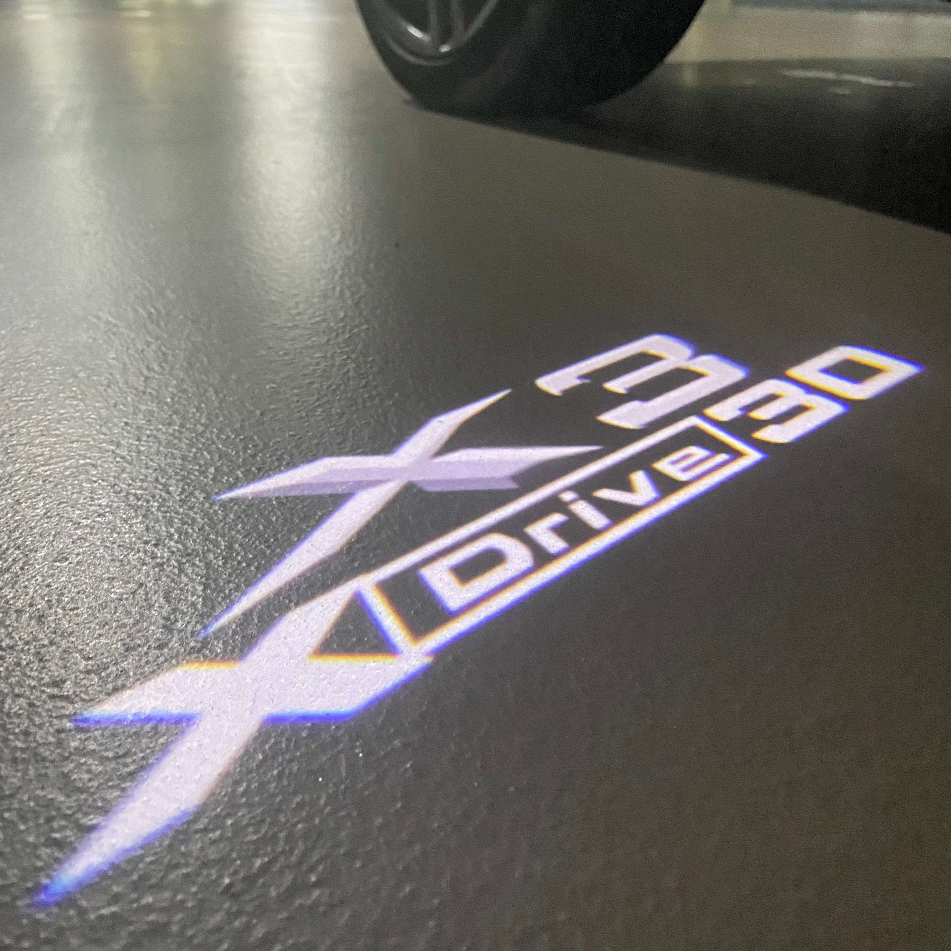 BMW X3 X Drive 30 LOGO PROJECTOT LIGHTS (quantity 1 = 1 sets/2 door lights) Nr.6024q0t25