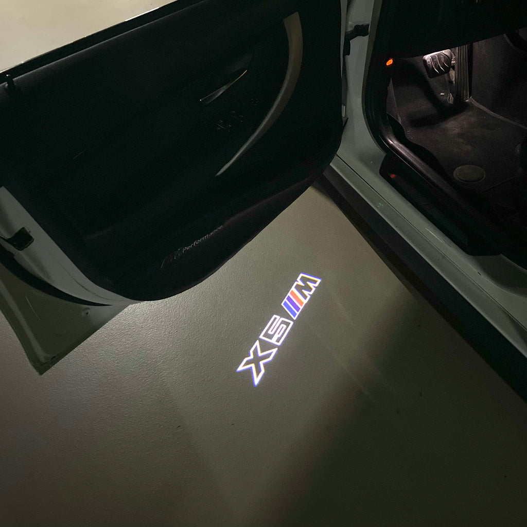 BMW X5M LOGO PROJECTOT LIGHTS (quantity 1 = 1 sets/2 door lights) Nr.6024q0t071