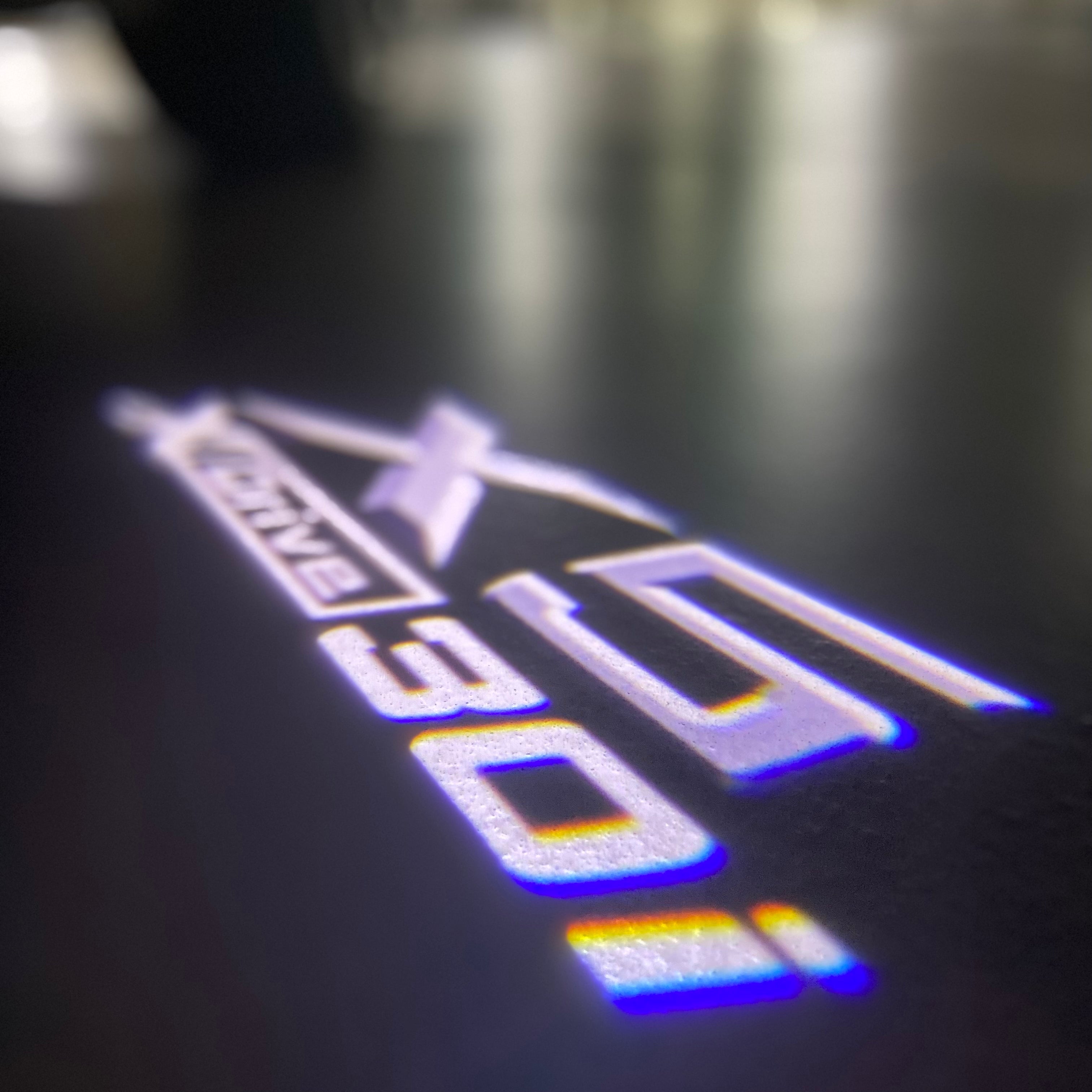 BMW X5 X Drive 30i  LOGO PROJECTOT LIGHTS (quantity 1 = 1 sets/2 door lights) Nr.6024q0t060