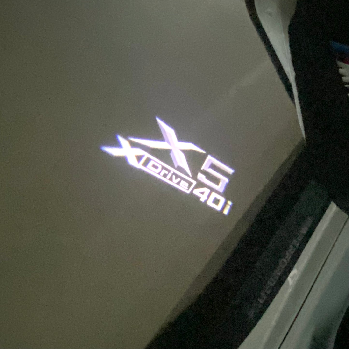 BMW X5 Xdrive 40i LOGO PROJECTOT LIGHTS (quantity 1 = 1 sets/2 door lights) Nr.6024q0t061