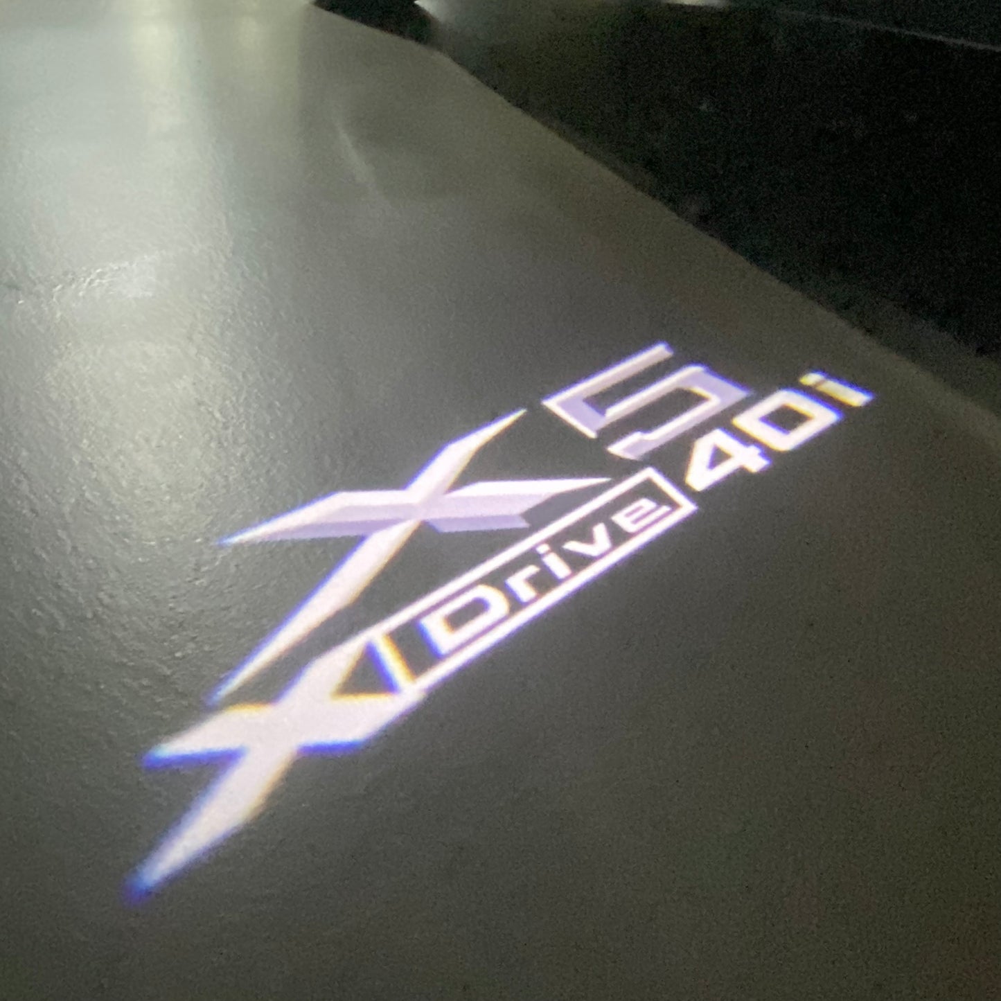BMW X5 Xdrive 40i LOGO PROJECTOT LIGHTS (quantity 1 = 1 sets/2 door lights) Nr.6024q0t061
