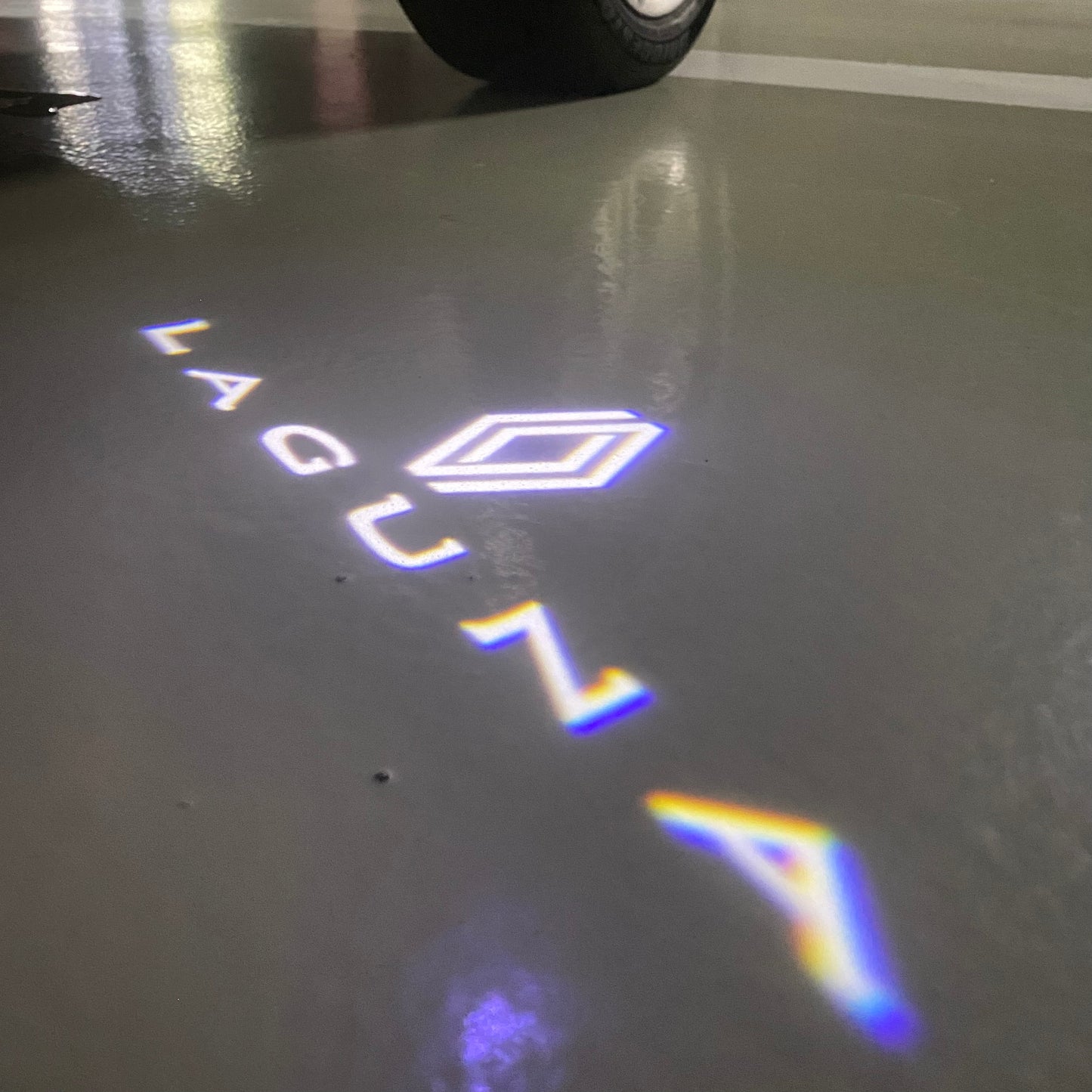RENAULT Laguna LOGO PROJECROTR LIGHTS Nr.0919 (quantity  1 =  2 Logo Film & 2 door lights)