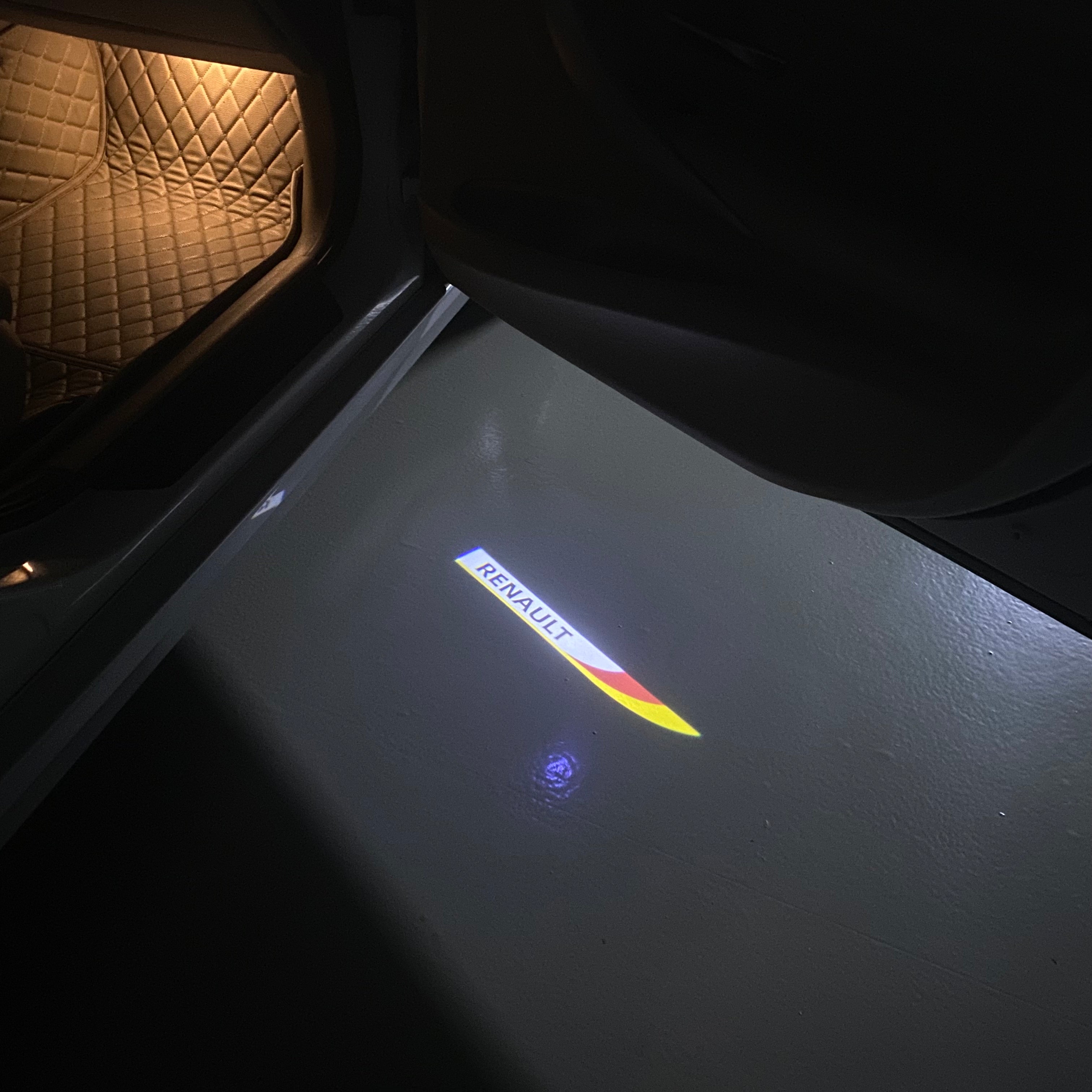 RENAULT ORIGINAL LOGO PROJECROTR LIGHTS Nr.0910 (quantity  1 =  2 Logo Film & 2 door lights)