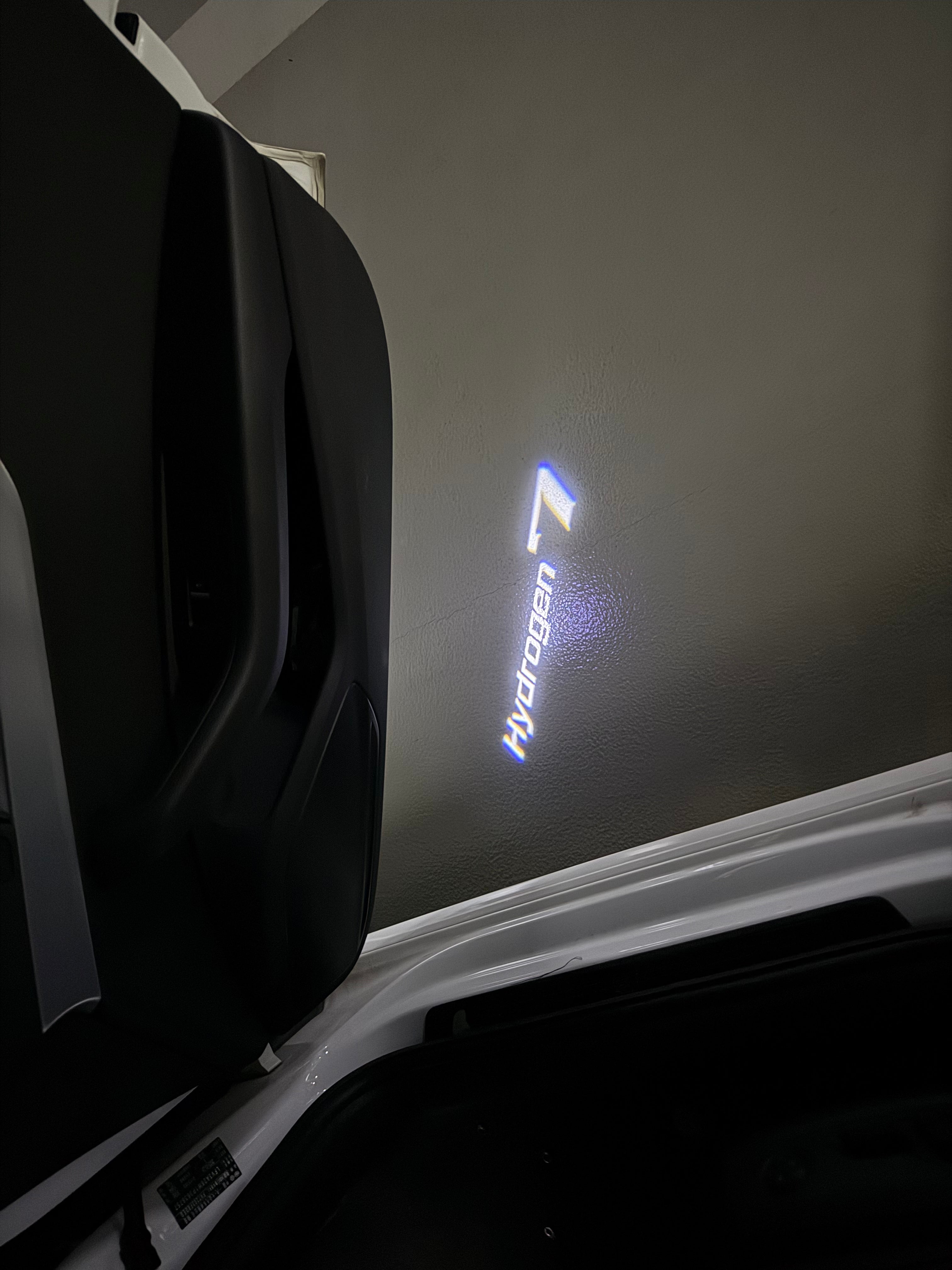 BMW HYDROGEN 7  LOGO PROJECTOT LIGHTS (quantity 1 = 1 sets/2 door lights) Nr.6024q0t077