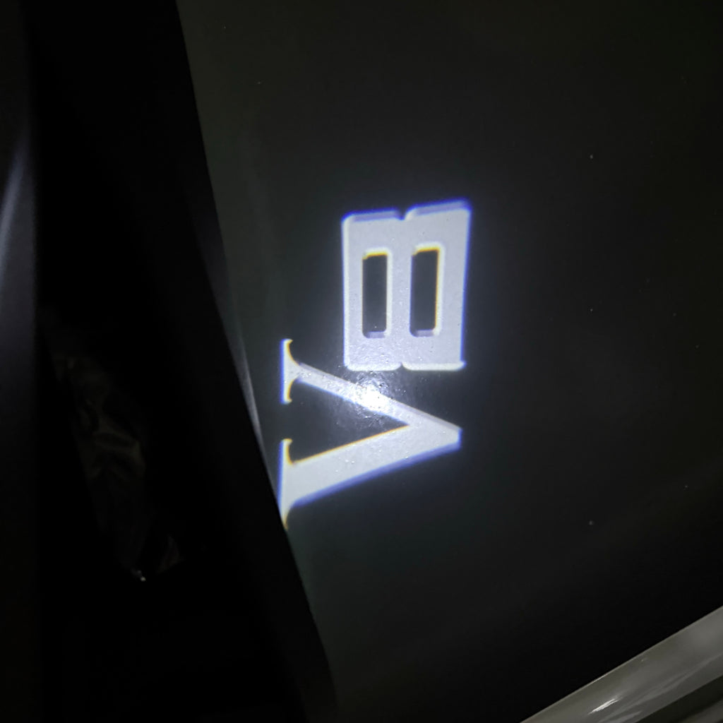 BMW  V8 LOGO PROJECTOT LIGHTS (quantity 1 = 1 sets/2 door lights) Nr.6024q0t087