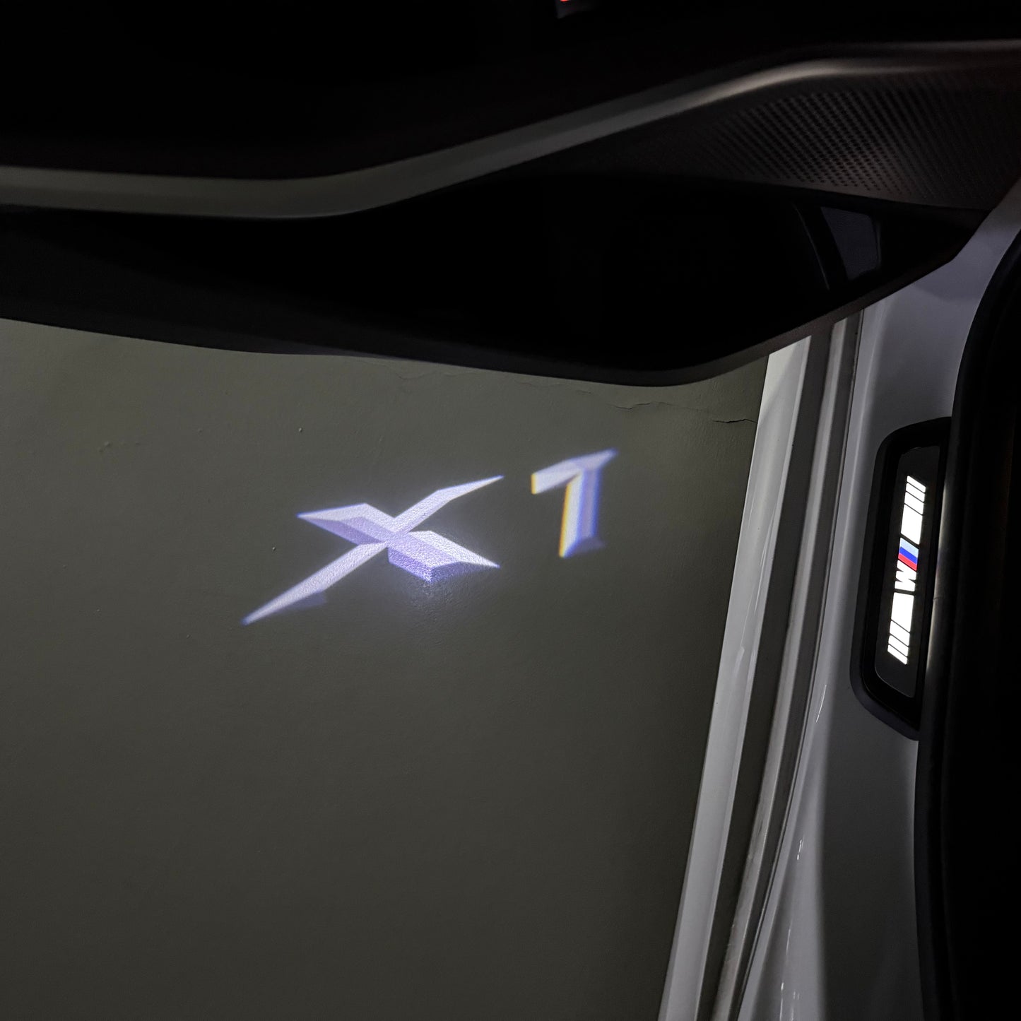 BMW X1  LOGO PROJECTOT LIGHTS (quantity 1 = 1 sets/2 door lights) Nr.6024q07
