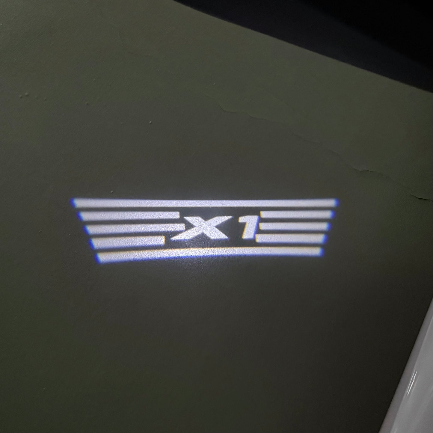 BMW X1  LOGO PROJECTOT LIGHTS (quantity 1 = 1 sets/2 door lights) Nr.6024q04