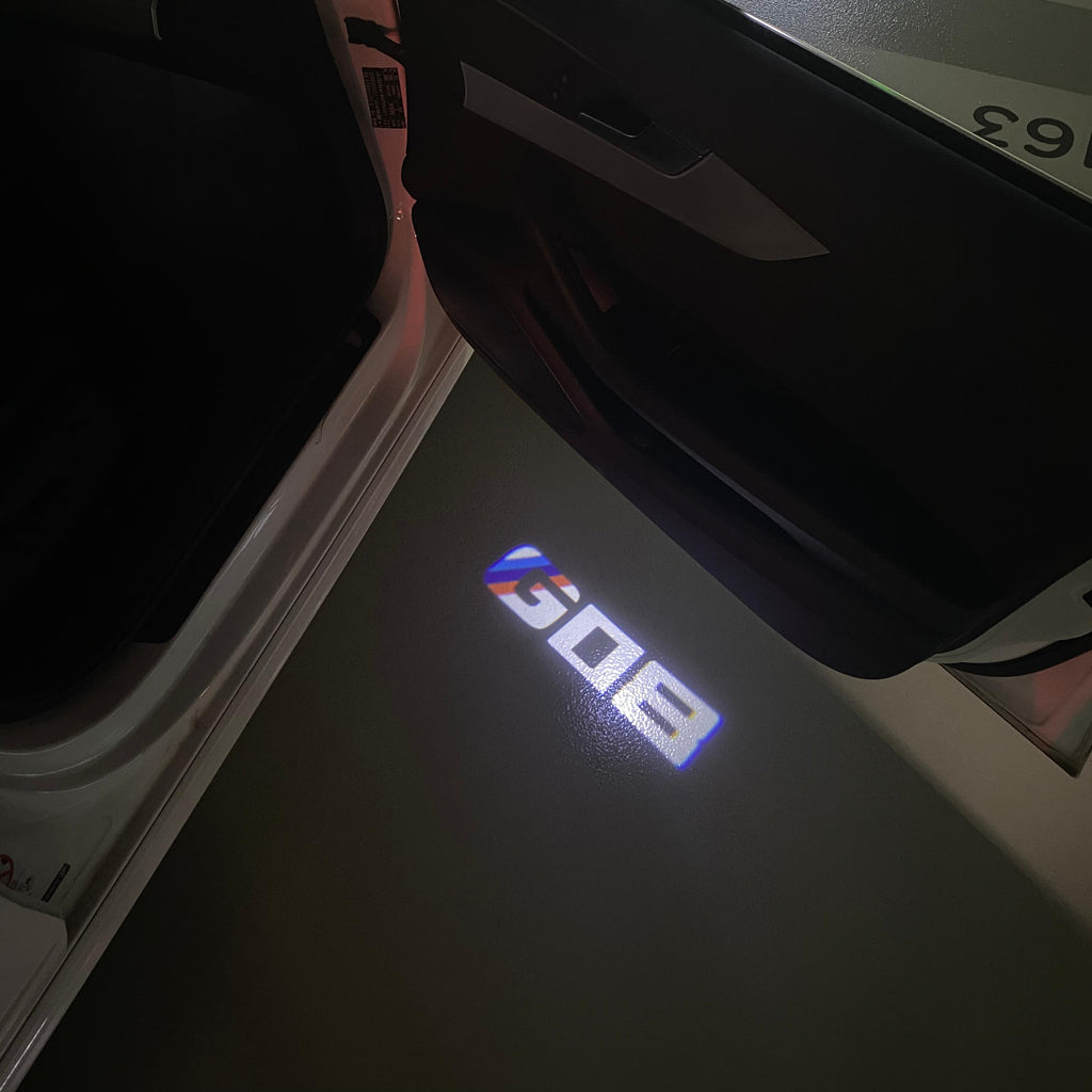 LUCES DE PROYECTOR DEL LOGOTIPO BMW M3 Nr.24 (cantidad 1 = 1 juegos / 2 luces de puerta)