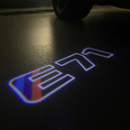 BMW X6 / X6M E71  LOGO PROJECTOT LIGHTS (quantity 1 = 1 sets/2 door lights) Nr.6024q0t0101