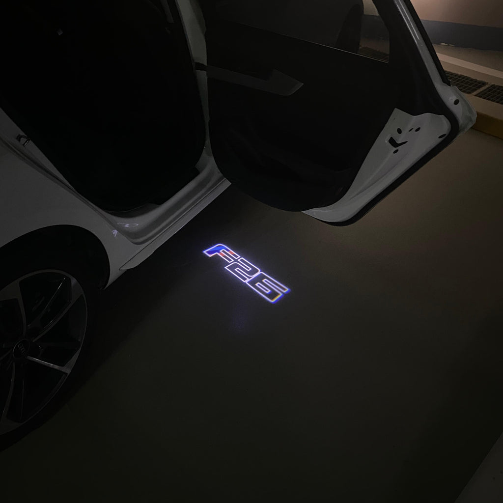 BMW X4 / X4M F26  LOGO PROJECTOT LIGHTS (quantity 1 = 1 sets/2 door lights) Nr.6024q0t04B7