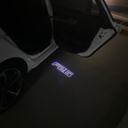 BMW X4 / X4M F26  LOGO PROJECTOT LIGHTS (quantity 1 = 1 sets/2 door lights) Nr.6024q0t04B7