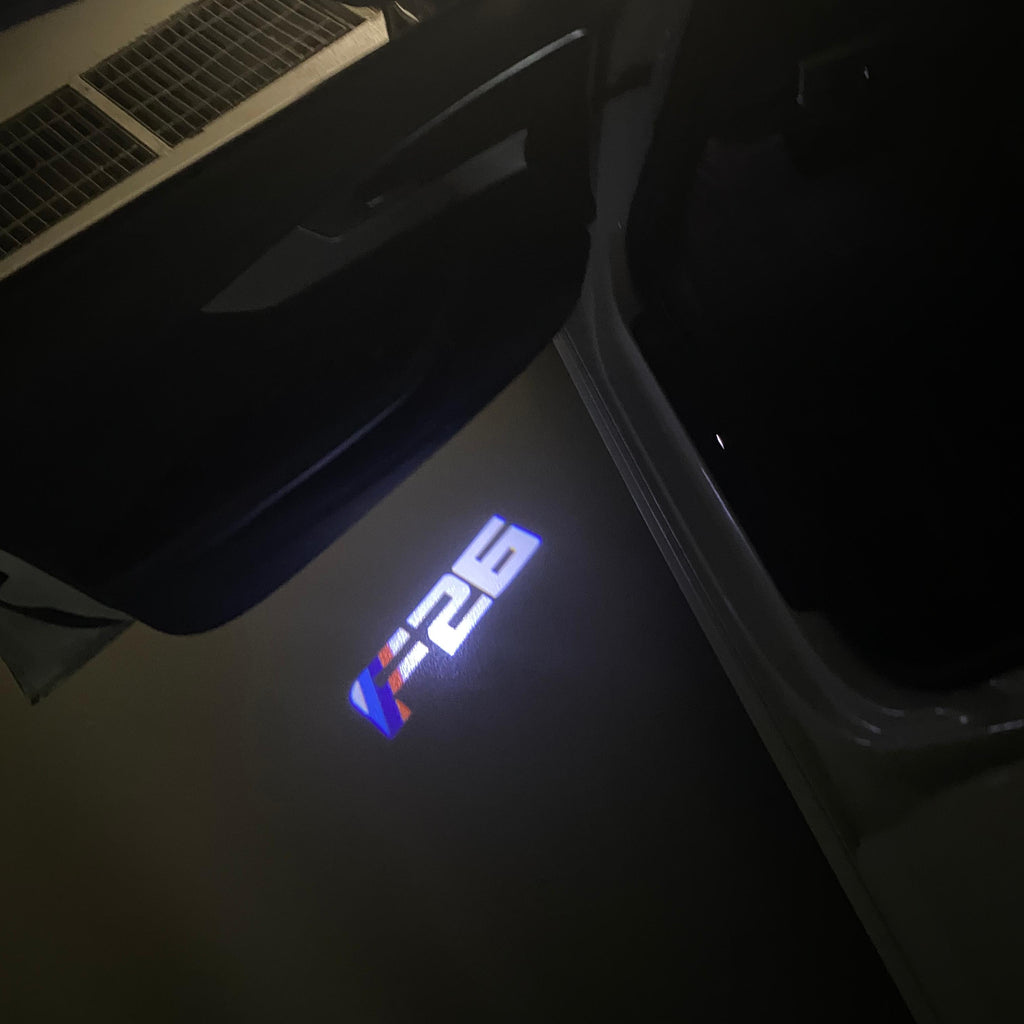 BMW X4 / X4M F26  LOGO PROJECTOT LIGHTS (quantity 1 = 1 sets/2 door lights) Nr.6024q0t043