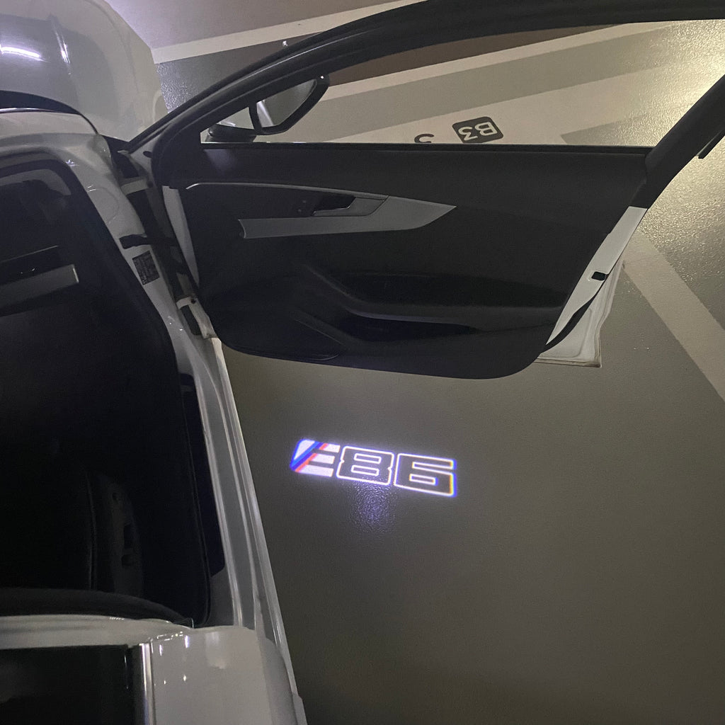 BMW X6 / X6M  E86  LOGO PROJECTOT LIGHTS (quantity 1 = 1 sets/2 door lights) Nr.6024t07