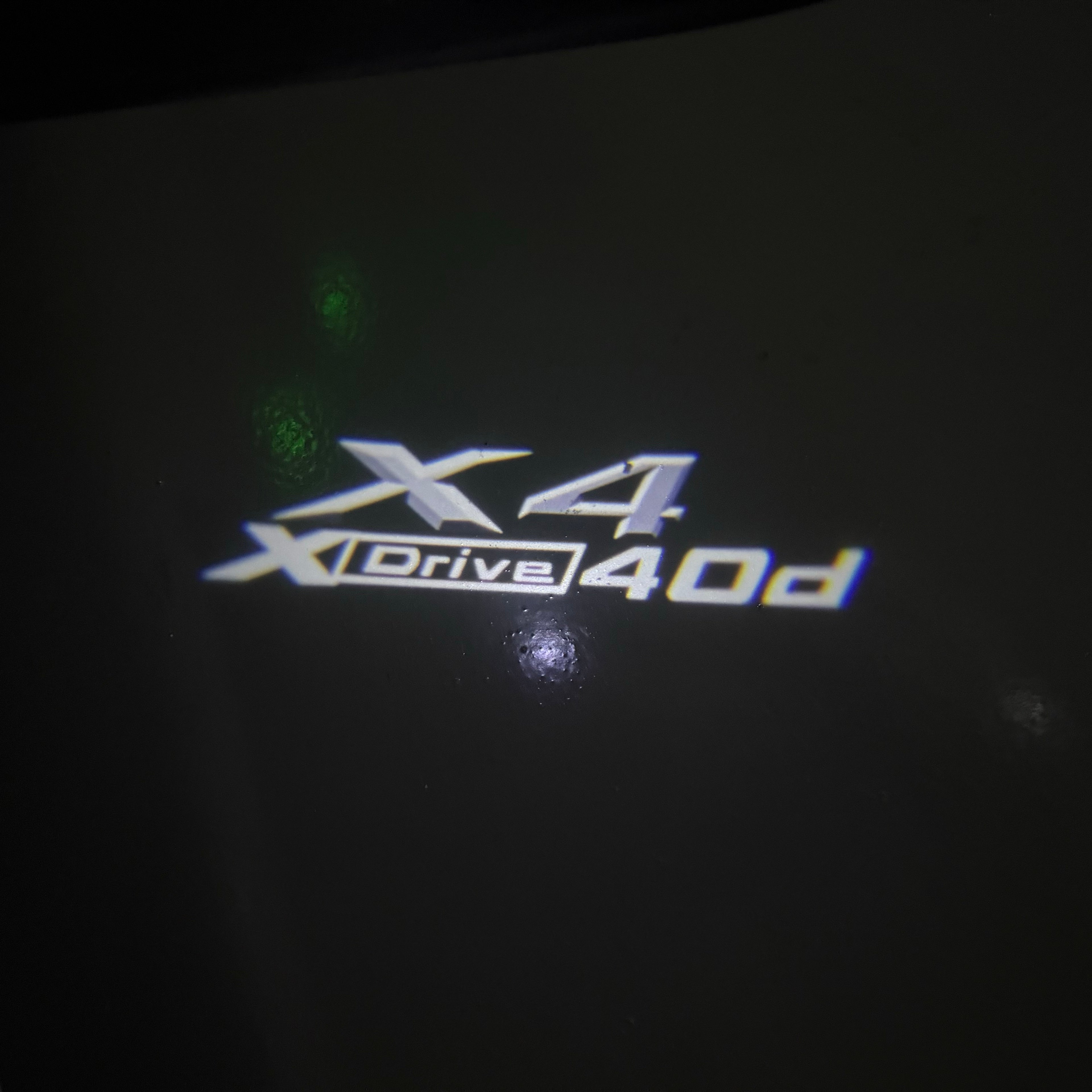 BMW X4 Drive 40d  LOGO PROJECTOT LIGHTS (quantity 1 = 1 sets/2 door lights) Nr.6024q0t040