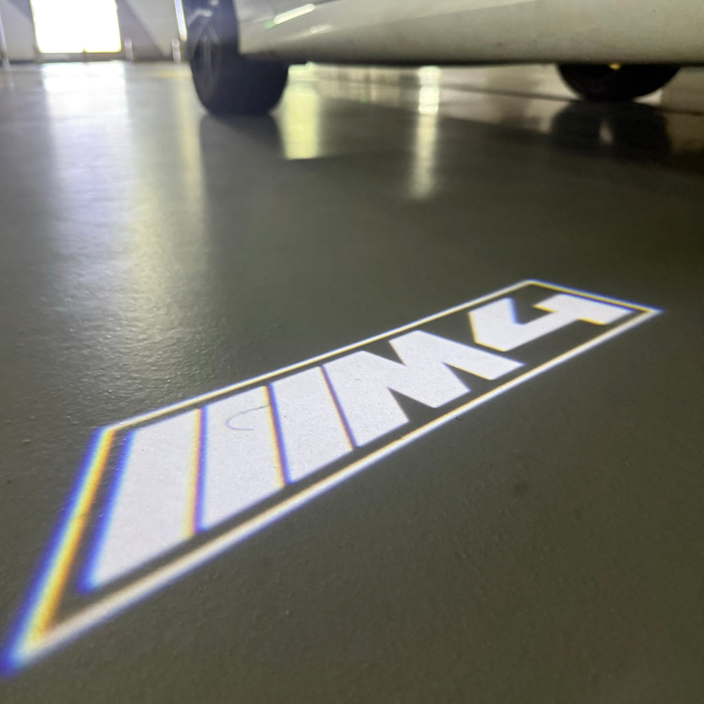 BMW  4  SERIES M4  LOGO PROJECTOT LIGHTS (quantity 1 = 1 sets/2 door lights) Nr.6024q43