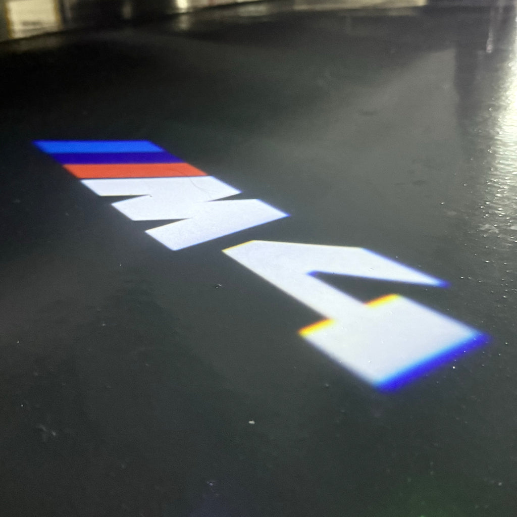 BMW 4  SERIES M4   LOGO PROJECTOT LIGHTS (quantity 1 = 1 sets/2 door lights) Nr.6024t33