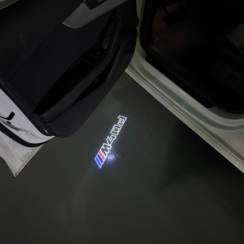 LUCES DE PROYECTOR DEL LOGOTIPO BMW M3 Nr.24 (cantidad 1 = 1 juegos / 2 luces de puerta)