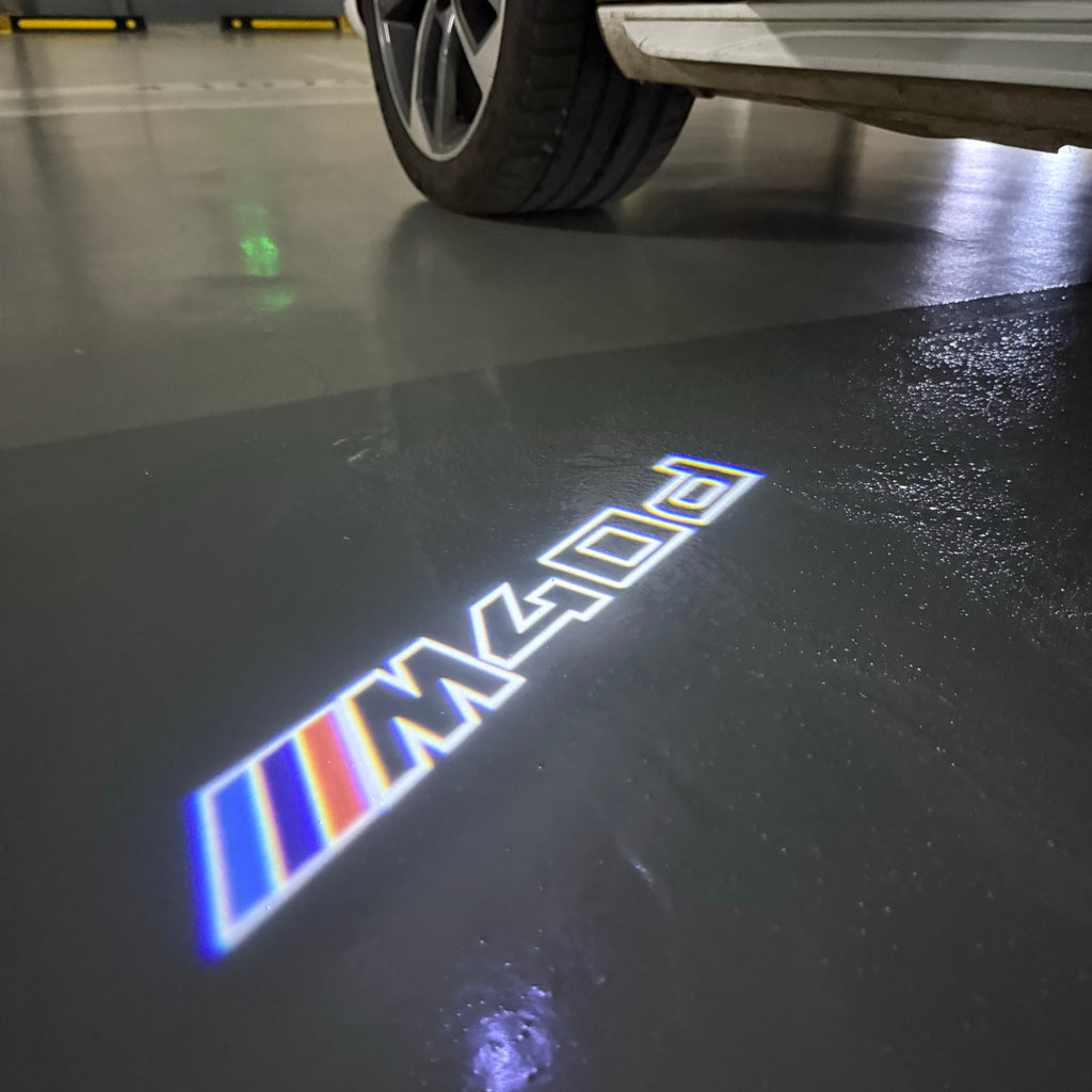 LUCES DE PROYECTOR DEL LOGOTIPO BMW M3 Nr.24 (cantidad 1 = 1 juegos / 2 luces de puerta)