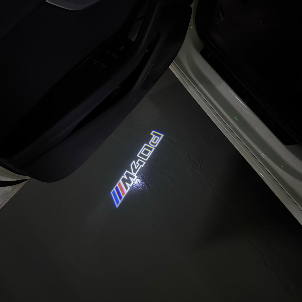 LUCES DE PROYECTOR DEL LOGOTIPO BMW M3 Nr.24 (cantidad 1 = 1 juegos / 2 luces de puerta)