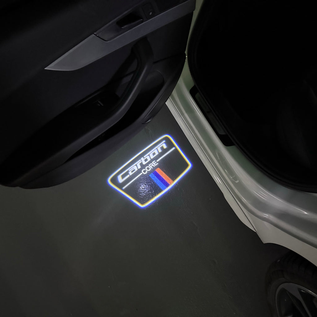 BMW Carbon    LOGO PROJECTOT LIGHTS (quantity 1 = 1 sets/2 door lights) Nr.6024q177