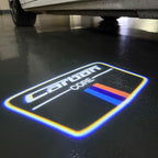 BMW Carbon    LOGO PROJECTOT LIGHTS (quantity 1 = 1 sets/2 door lights) Nr.6024q177