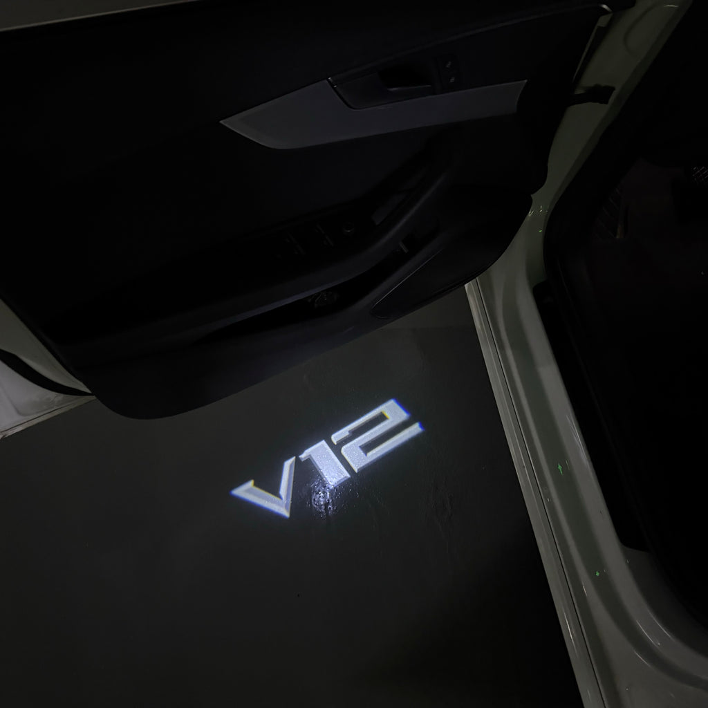 BMW 7 SERIES V12  LOGO PROJECTOT LIGHTS (quantity 1 = 1 sets/2 door lights) Nr.6024q182
