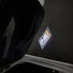 BMW ORIGINAL  LOGO PROJECTOT LIGHTS (quantity 1 = 1 sets/2 door lights) Nr.6024q99