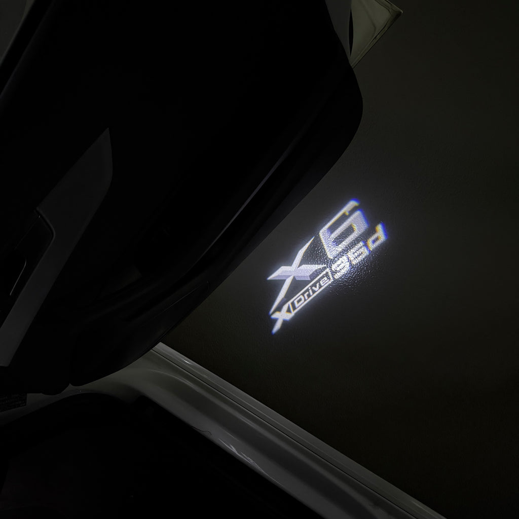 BMW M3 LOGO PROJECTOR LIGHTS Nr.24 (الكمية 1 = 1 مجموعة / 2 أضواء باب)