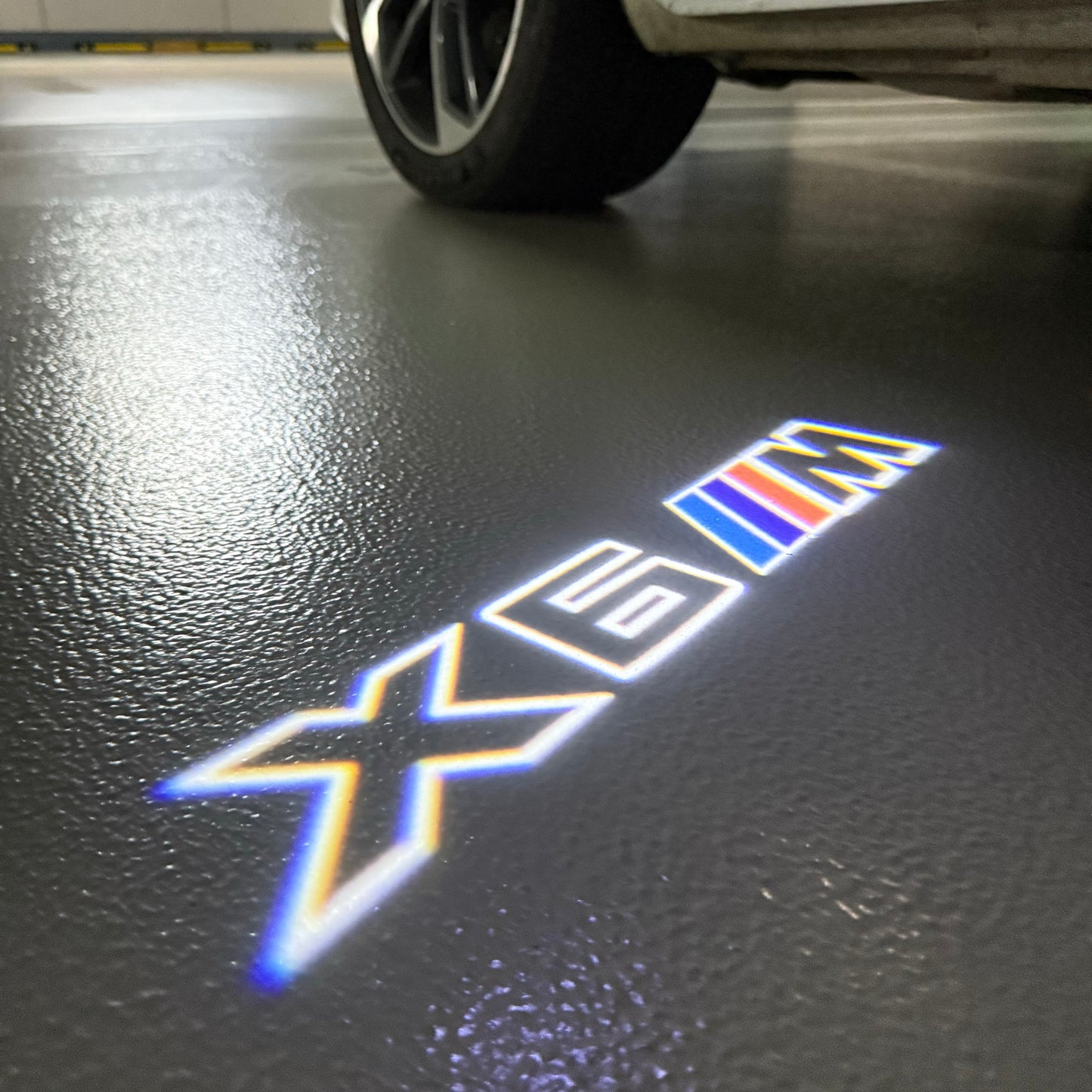 BMW  X6M LOGO PROJECTOT LIGHTS (quantity 1 = 1 sets/2 door lights) Nr.6024q0t0106