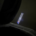BMW M3 LOGO PROJECTOR LIGHTS Nr.24 (الكمية 1 = 1 مجموعة / 2 أضواء باب)