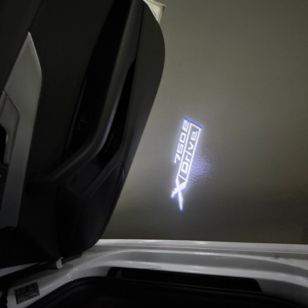 BMW 7 SERIES 750 e LOGO PROJECTOT LIGHTS (quantity 1 = 1 sets/2 door lights) Nr.6024q184