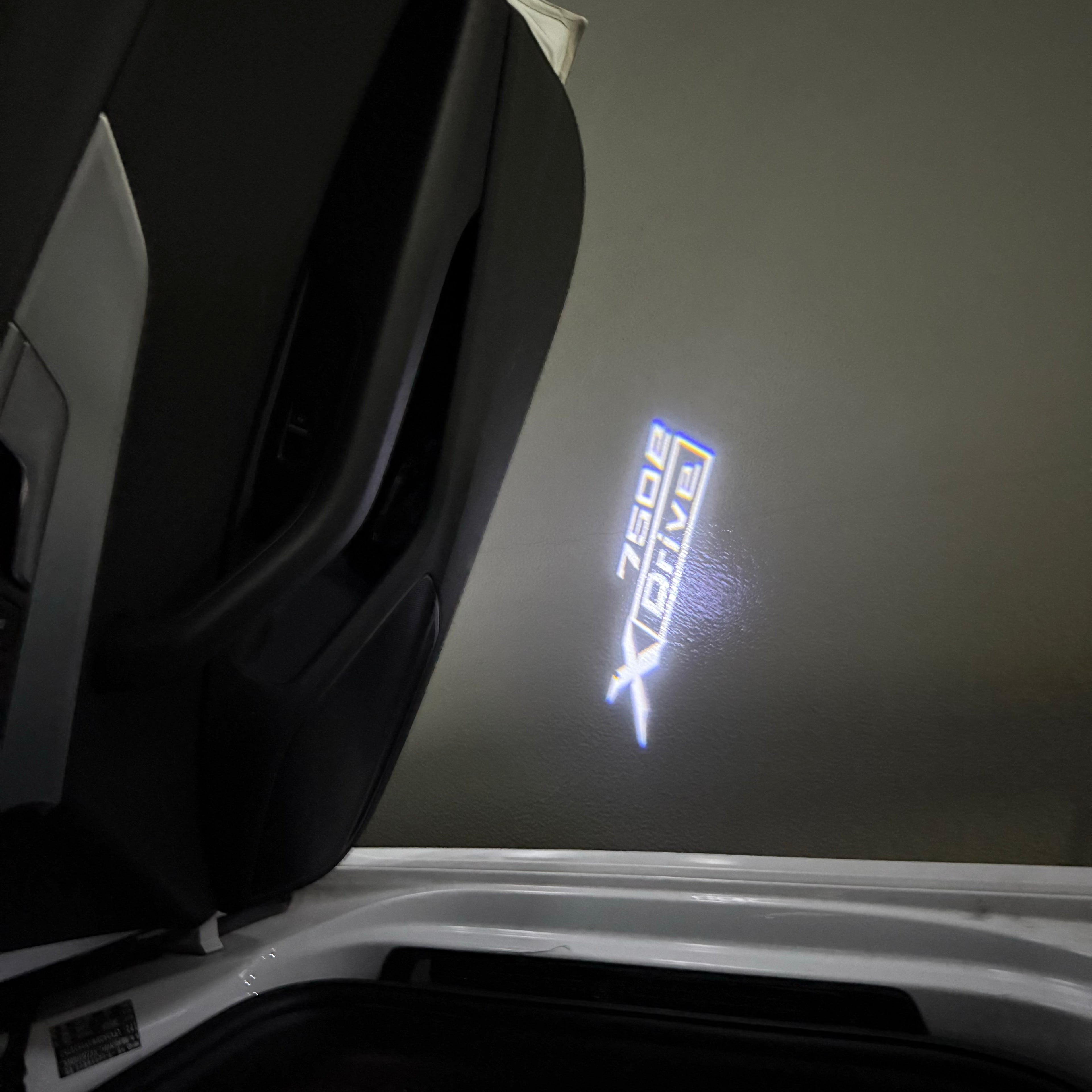 BMW 7 SERIES 750 e LOGO PROJECTOT LIGHTS (quantity 1 = 1 sets/2 door lights) Nr.6024q184