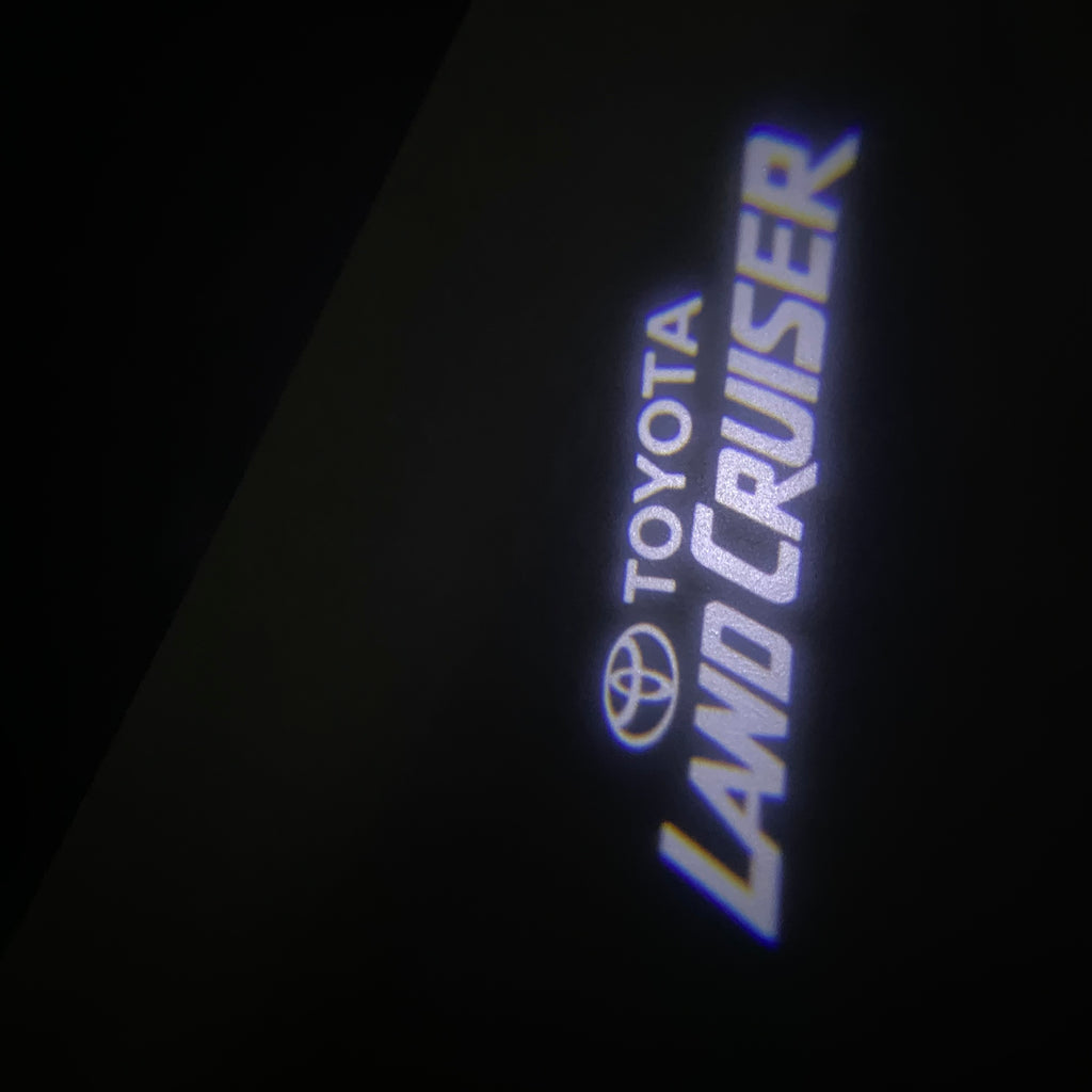 TOYOTA  LAND CRUISER  LOGO PROJECROTR LIGHTS  (quantity 1 = 1 sets/2 door lights) Nr.0GP38