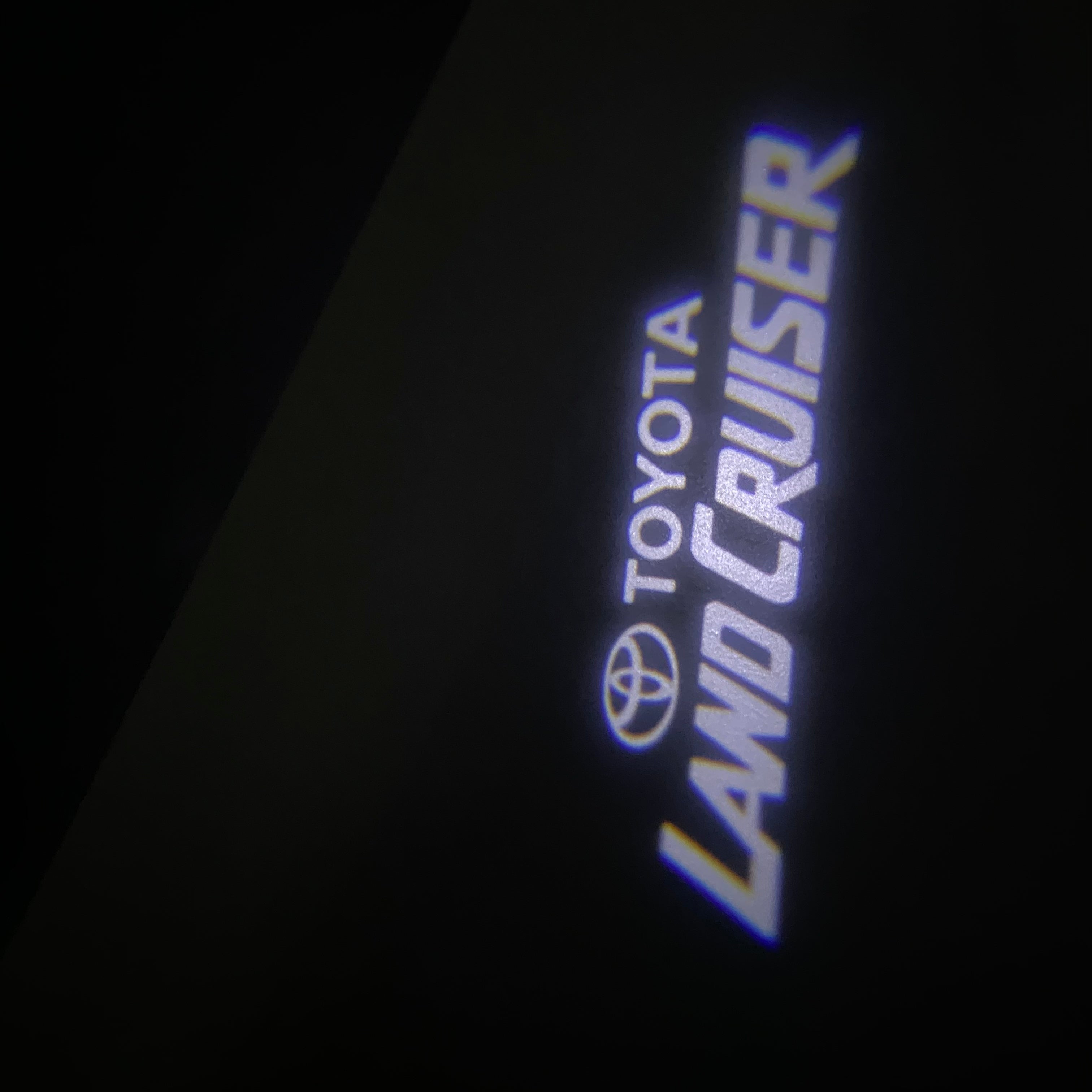 TOYOTA  LAND CRUISER  LOGO PROJECROTR LIGHTS  (quantity 1 = 1 sets/2 door lights) Nr.0GP38
