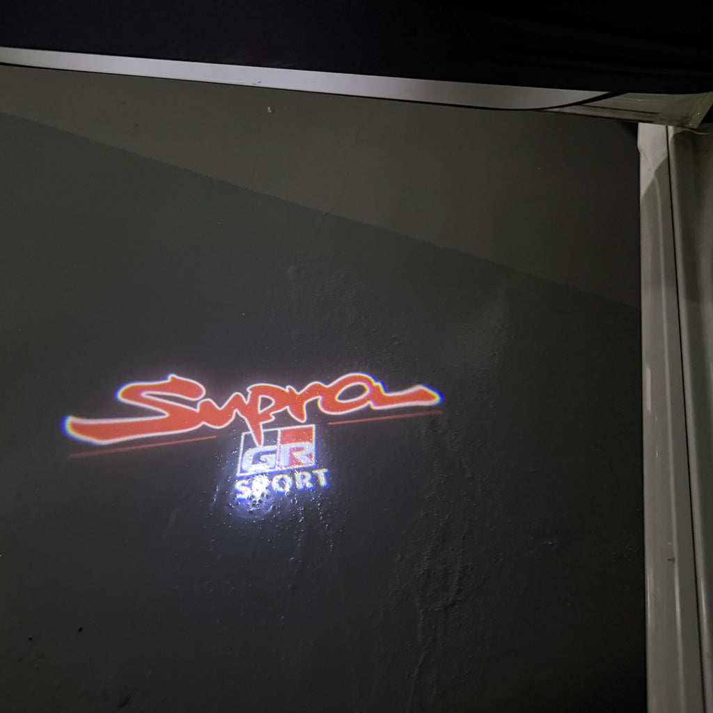 TOYOTA  SUPRA    LOGO PROJECROTR LIGHTS  (quantity 1 = 1 sets/2 door lights) Nr.0G35