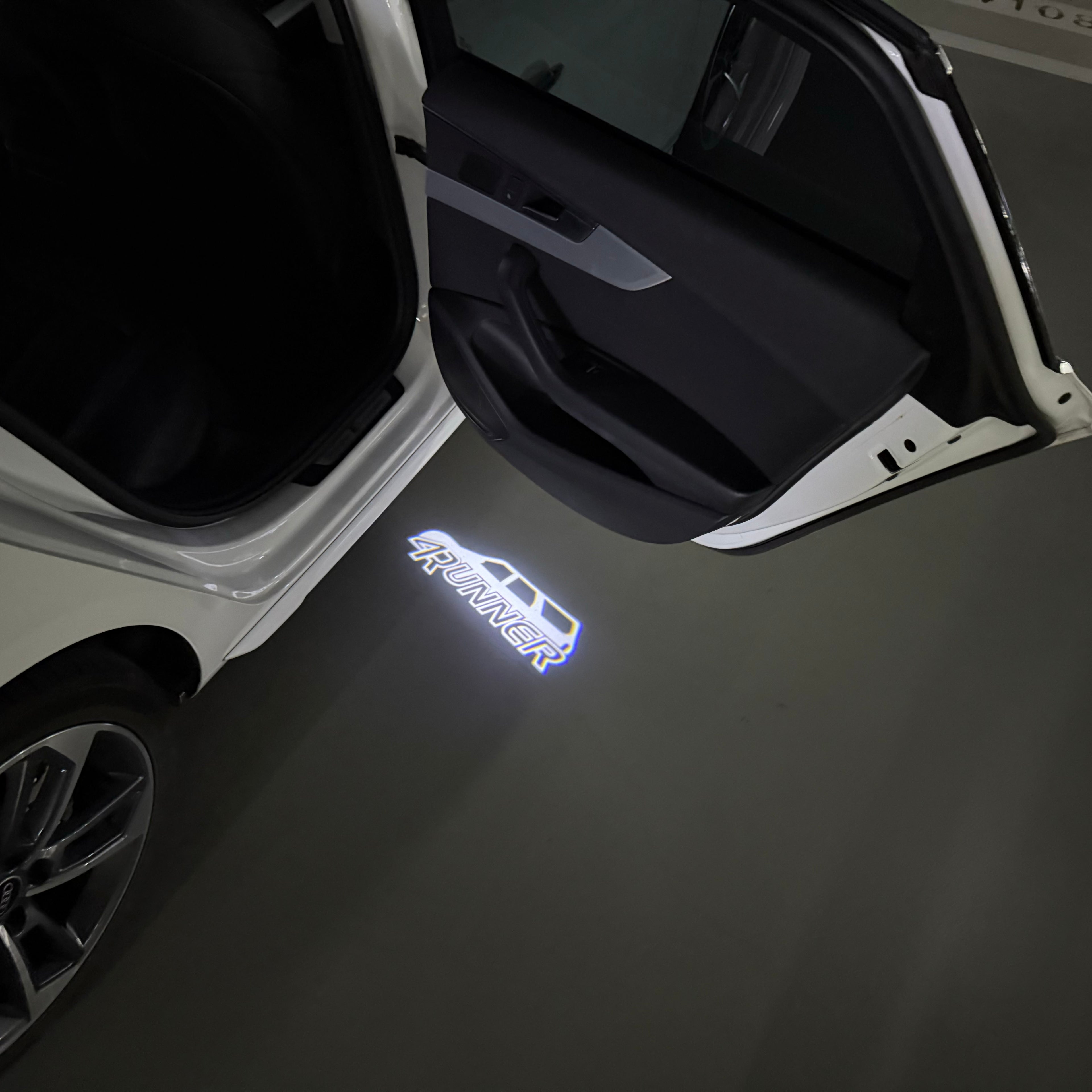 TOYOTA  4RUNNER  LOGO PROJECROTR LIGHTS  (quantity 1 = 1 sets/2 door lights) Nr.0GP08